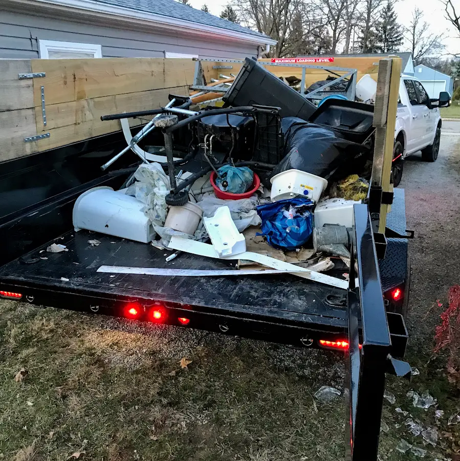 Roll-off dumpster delivered to a residential driveway in Rock Island